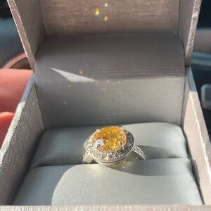 Halo white gold 18k and 4karat yellow diamond Ring